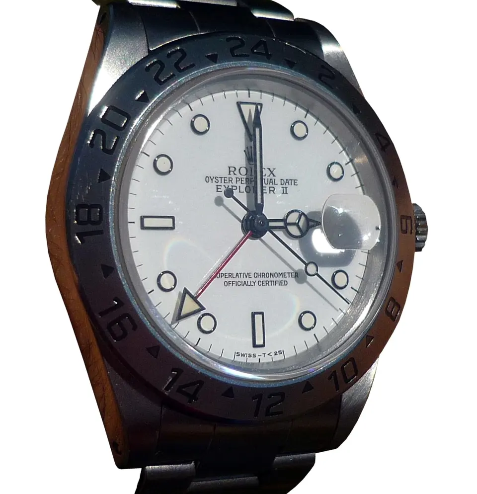 Stainless steel Rolex Explorer II ref. 16570 with white polar dial and 24-hour bezel, isolated on white — stand-in photograph